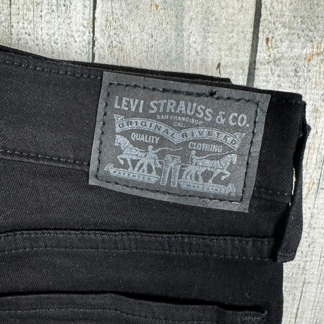 Levis 710 Super Skinny Mid Rise Black Denim Jeans - Size 27 - Jean Pool