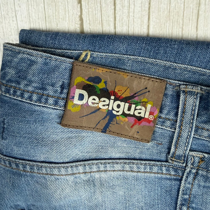 Desigual &