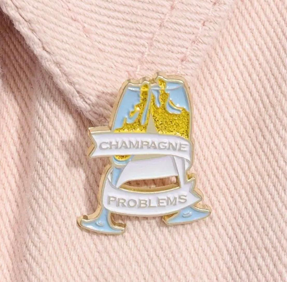 ‘Champagne Problems' - Enamel Pin - Jean Pool