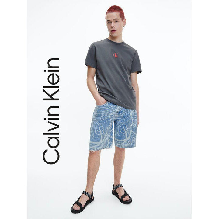 NWT- Calvin Klein Mens Wide Leg Printed Denim Shorts -Size 34 - Jean Pool